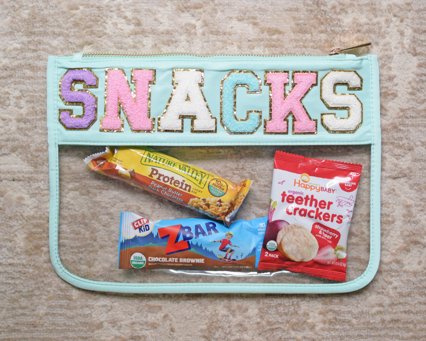 Snacks Varsity Letter Chenille Patches on Teal/Clear Pouch